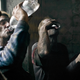 Coal miners drink moonshine after work in Enakievo.